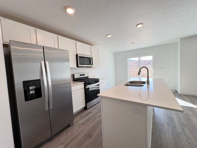 Building Photo - FOUR BED HOME AVAILABLE NOW