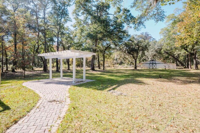 Building Photo - Secluded Four Bedroom Home on Seven Acres in Midway Farms!