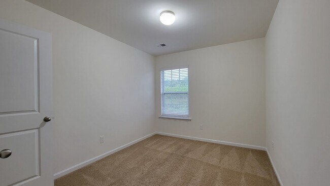 Building Photo - Modern 3-Bedroom Multiplex with 3 Full Bat...