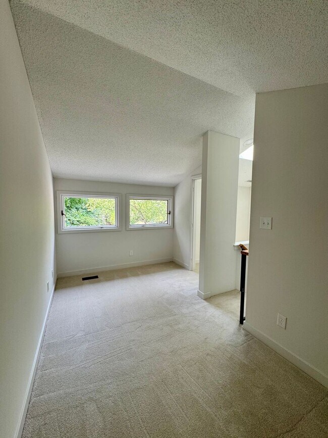 Building Photo - Spacious 2-Story Falconbridge Condo with Private Courtyard and Resort-Style Amenities
