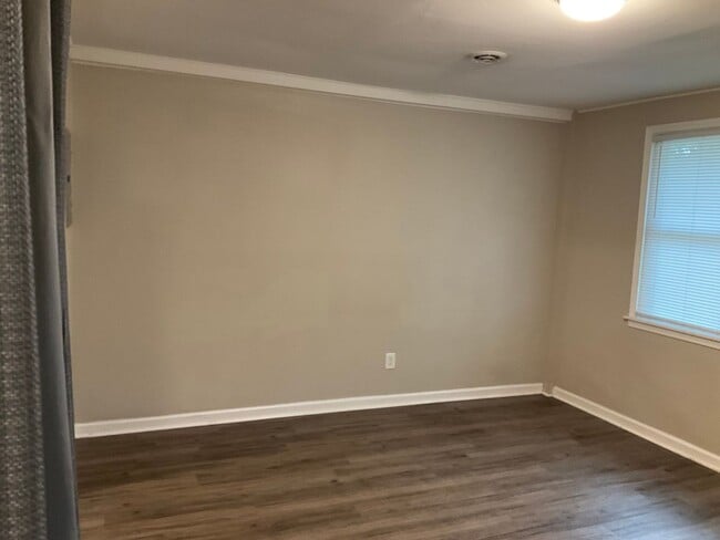 Building Photo - This two bedroom one bath duplex is centrally located. Just minutes to area bases, beaches, shopp...