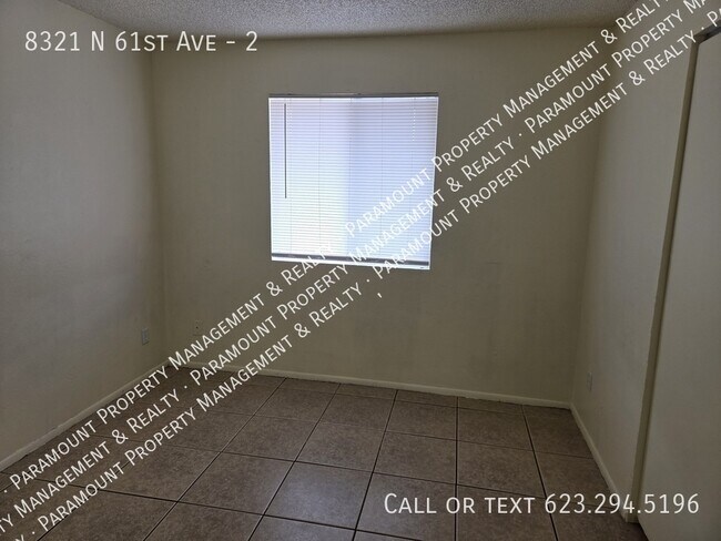 Building Photo - 8321 N 61st Ave