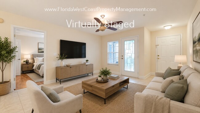 Building Photo - MOVE IN READY! LARGE 2 BEDROOM/2 BATH PLUS ATTACHED GARAGE! TILE/LVP THROUGHOUT!