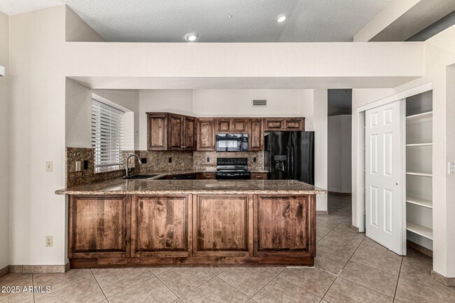 Building Photo - 8829 E Riviera Dr