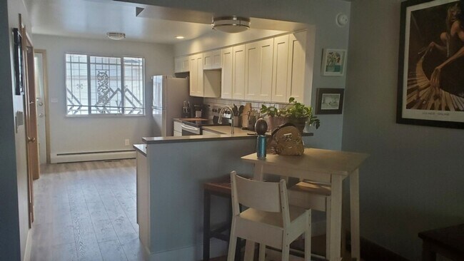 Building Photo - Charming 2BD, 1BA Wheat Ridge Duplex with 1-Car Garage