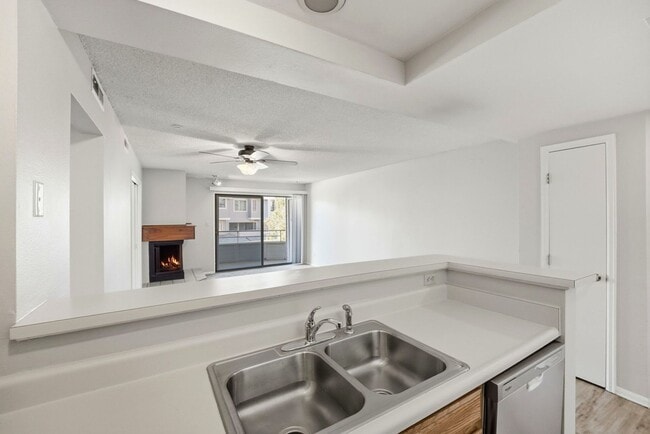 Building Photo - Charming 2 Bedroom Second Story Condo with easy access to everything!