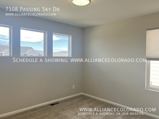 Building Photo - 7108 Passing Sky Dr