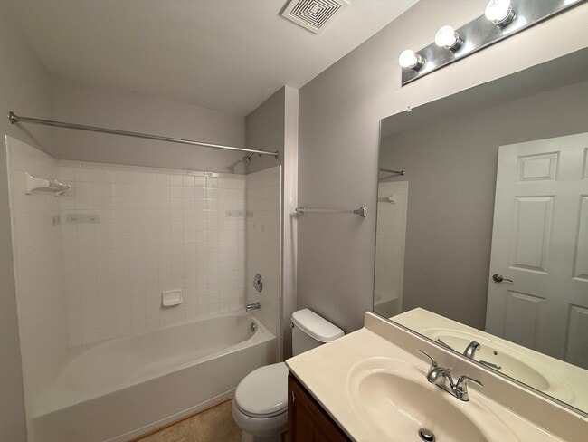 Building Photo - Spacious 2-Level Condominium