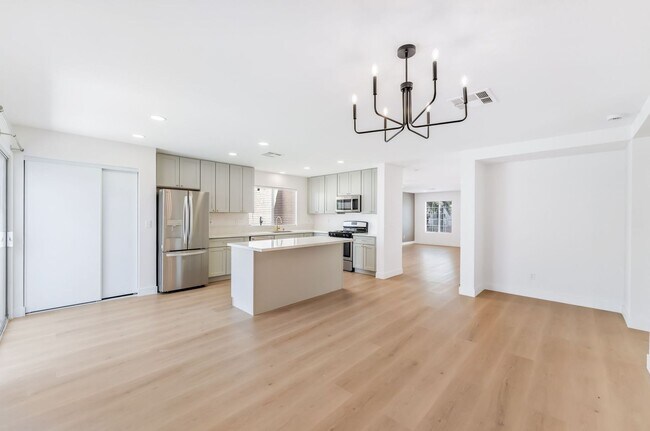 Building Photo - Modern Designer Remodel with Stylish Finishes & Spacious Outdoor Living!