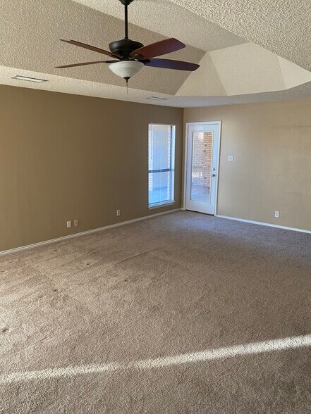 Primary Bedroom Door Leading to Back Patio - 4406 Parkhurst Dr