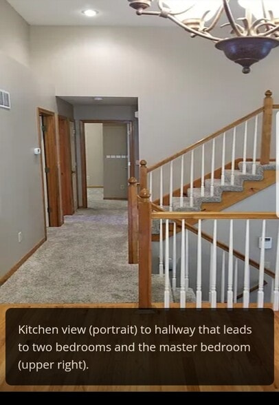 Walkway from dining are to bedrooms and up to master - 21506 W 53rd Terrace