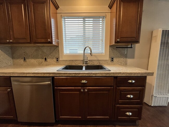 Building Photo - 8001 N Woolsey Ave