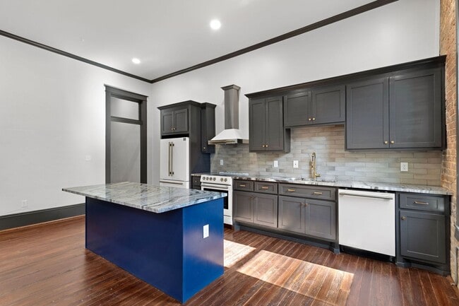 Building Photo - Historic Charm Meets Modern Luxury