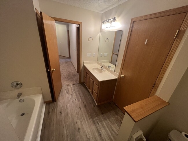 Building Photo - Spacious 3BR/1.5BA Townhome with Attached ...