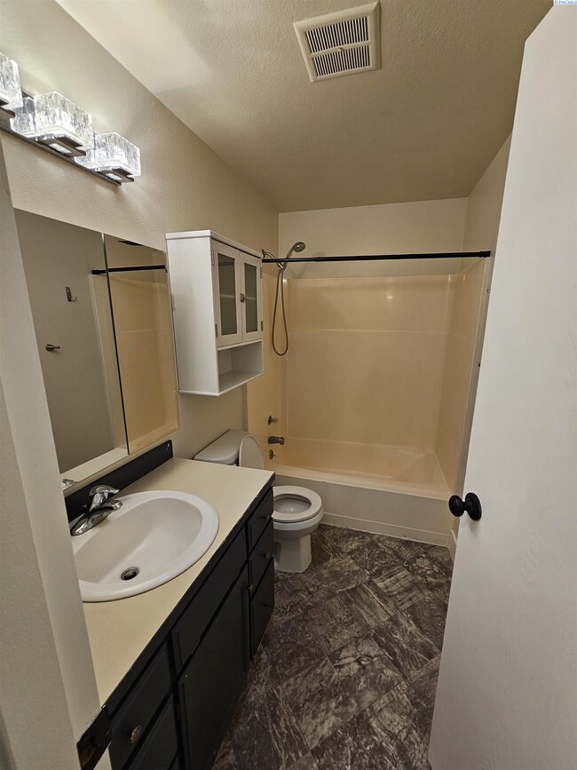 Building Photo - Completely Remodeled Condo; Very Private & Quiet
