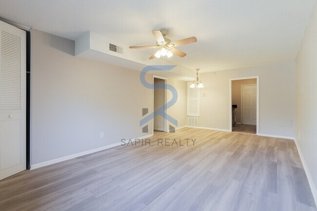 Building Photo - Move in before November 30th and choose your reward: a $250 Amazon Gift Card or a 55 Smart TV!