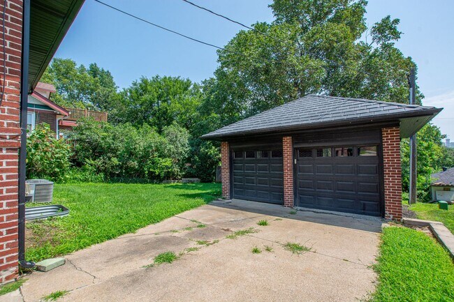 Building Photo - Adorable Brick 4 Bedroom Ranch with Finish...