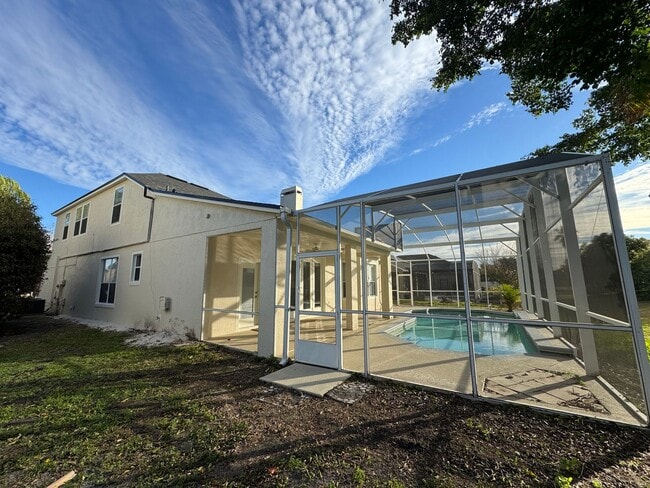 Building Photo - Spacious 4-Bedroom Home with Private Pool and Modern Comforts