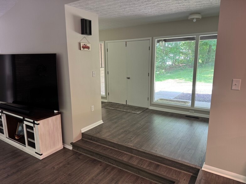 Front Entry view from Living Room - 1466 Lake Roger Dr