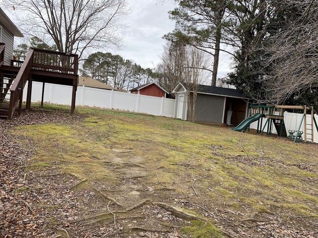 backyard with privacy vinyl fence - 3705 Pfost Ave