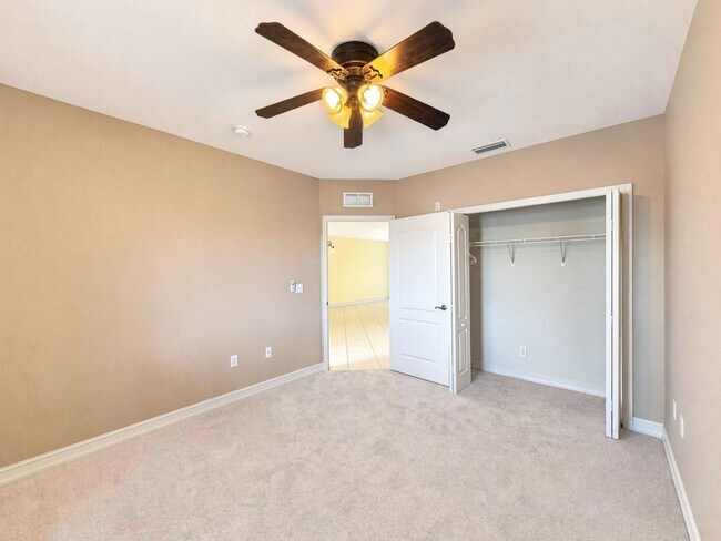 Building Photo - AVAILABLE NOW! Top-Floor Condo | Gated Community | Preserve Views | Water, Sewer & Cable Included