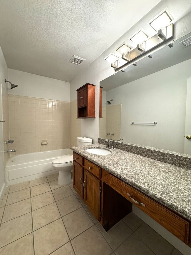 Building Photo - 3 BEDROOM WITH FIREPLACE AND LVP PLANK FLO...
