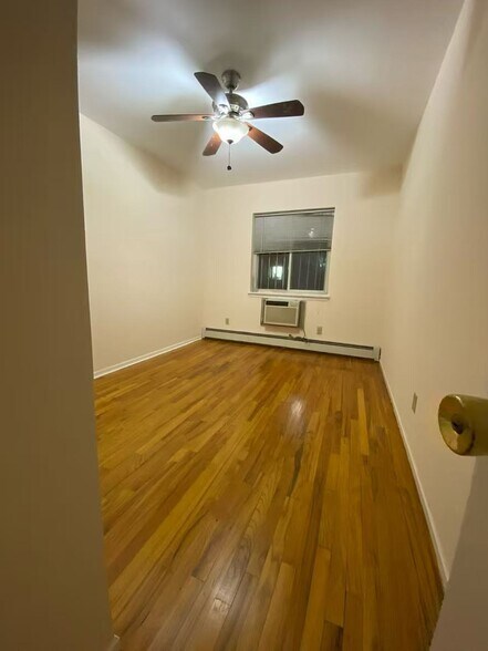 Building Photo - 35-22-22 163rd St