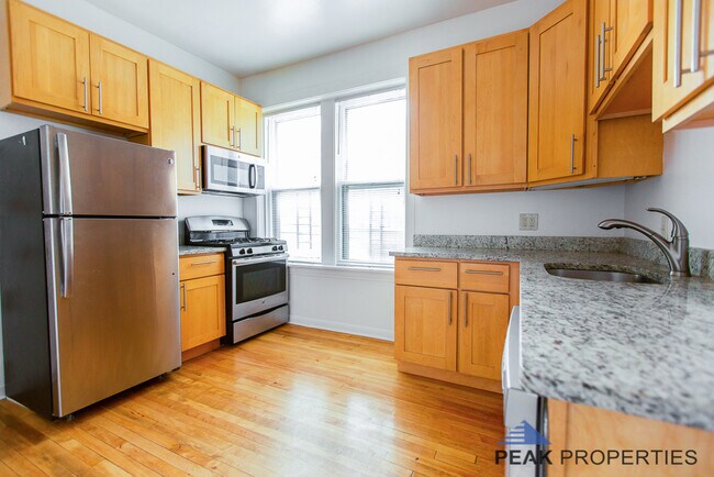 Building Photo - 1104 N Oakley Blvd