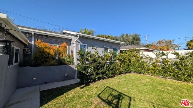 Building Photo - 7851 Airlane Ave