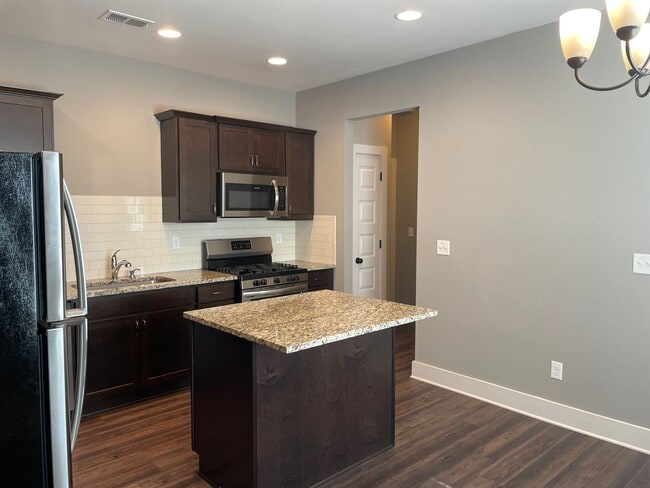 Building Photo - 3 Bedroom Home With Spacious Garage and Fenced Backyard!