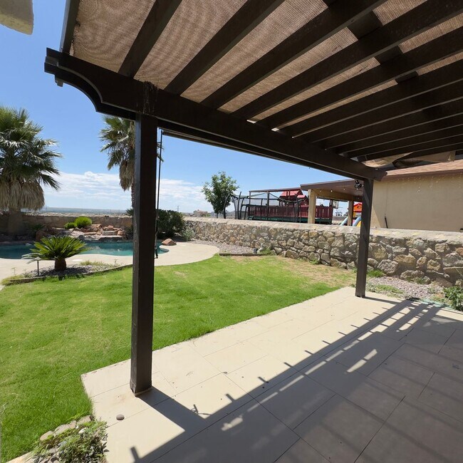 Building Photo - 4 Bedrooms, 3 Baths, a Pool, and Solar Panels!