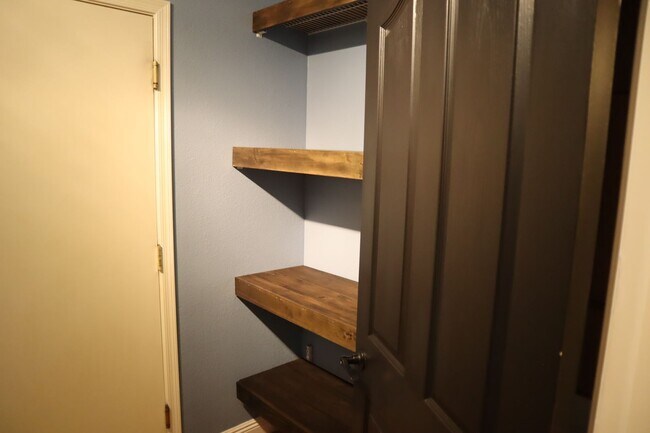 Building Photo - Home With A Pool and Much More!