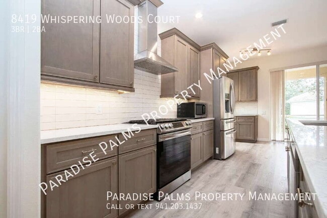 Building Photo - 8419 Whispering Woods Ct