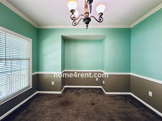 Building Photo - Blue Valley Schools w/ Wood Floors, Finished Basement and a Peaceful, Private Fenced Yard!