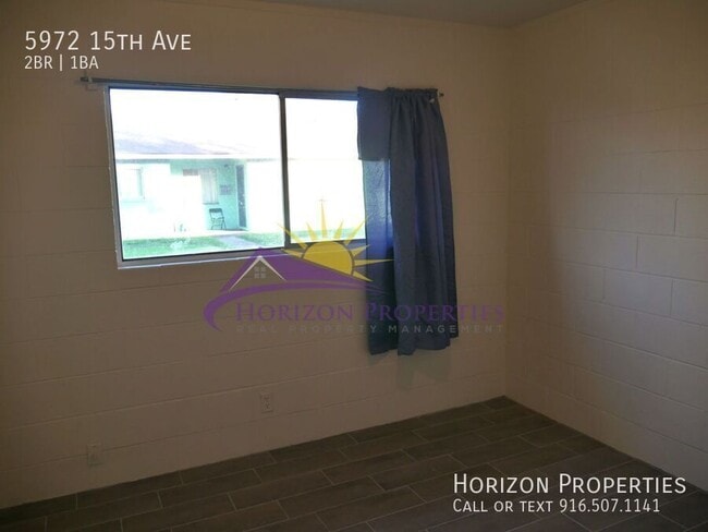 Building Photo - 5972 15th Ave