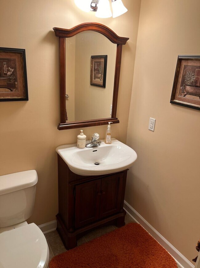 Building Photo - Updated & Landscaped 4 Bedroom, 4 Bath Hom...