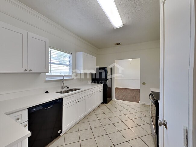 Building Photo - 9116 Dolphin Cir