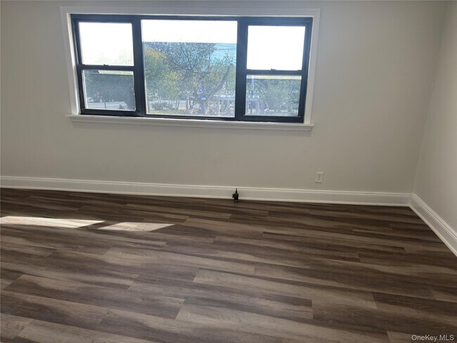 Building Photo - 219-07 Jamaica Ave