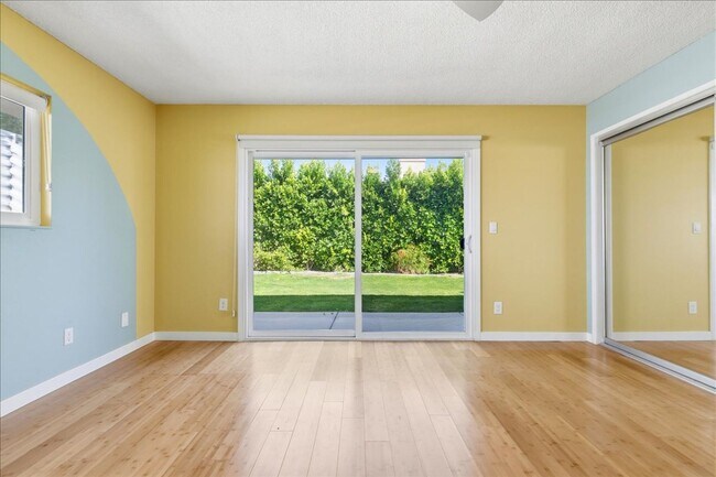 Building Photo - 3 bed / 2 Bath Mid-Century Home with Two-Car Garage, Soaking Pool and Manicured Backyard!