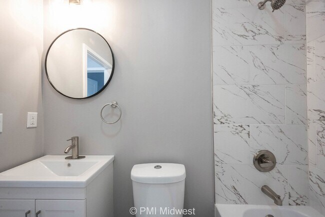 Building Photo - "Spacious 3-Bedroom Duplex with Granite Charm in Indianapolis – 1250 Sq Ft of Modern Living!"