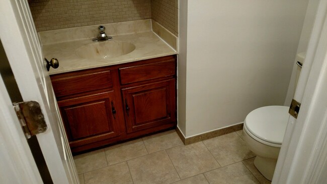 Downstairs bathroom, from a very similar unit, rennovated at the same time as current unit for rent - 1410 Skyline Dr