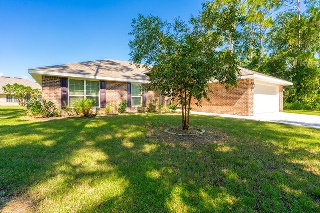 Building Photo - Beautiful 4-Bedroom Home in Palm Coast – B...