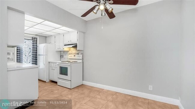 Building Photo - 1 br, 1 bath House - 1855 Plunkett St Apt 403