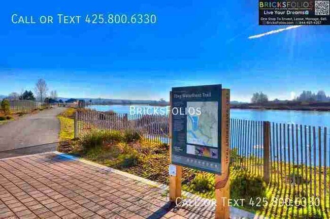 Building Photo - Live Brand-New in the Heart of It All. Lak...