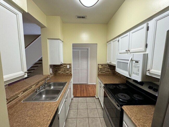 Building Photo - Introducing a beautiful townhouse-style Condo