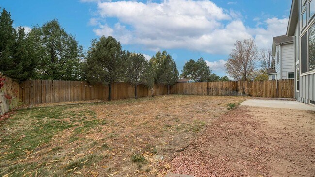 Building Photo - Four bedroom in Gatehouse Village with Fenced Yard and Views!