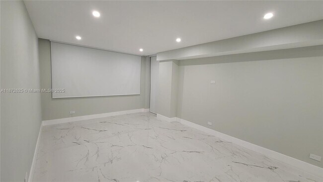 Building Photo - 6039 Collins Ave