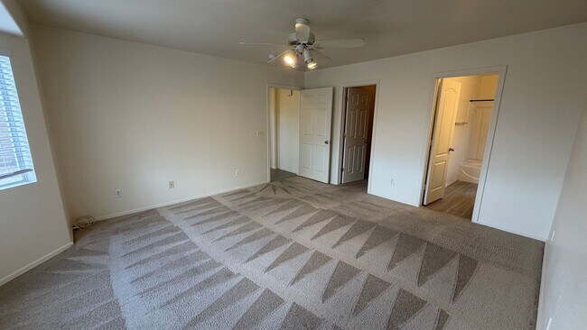 Building Photo - Two Story Home with NEW tile and a large backyard!