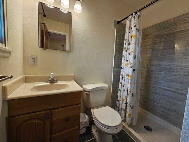 Building Photo - 4-Bedroom Home with In-Ground Pool, Solar ...