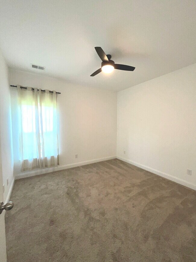 Building Photo - "Spacious 4-Bed Oasis with Stunning Lake V...